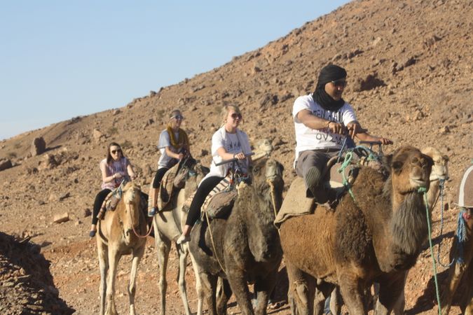 enjoying the day riding a camel 